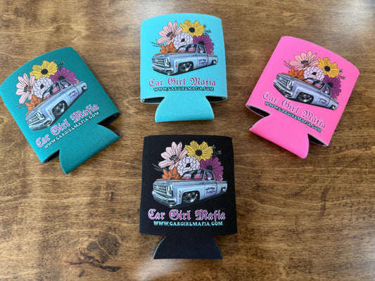 Four can coolers with 'Car Girl Mafia' design on a wooden surface